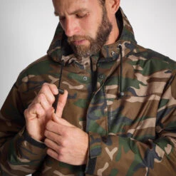 VESTE IMPERMEABLE CHAUDE 100 CAMO WOODLAND 15 VESTE IMPERMEABLE CHAUDE 100 CAMO WOODLAND -Aventure Soldes veste impermeable chaude 100 camo woodland 3